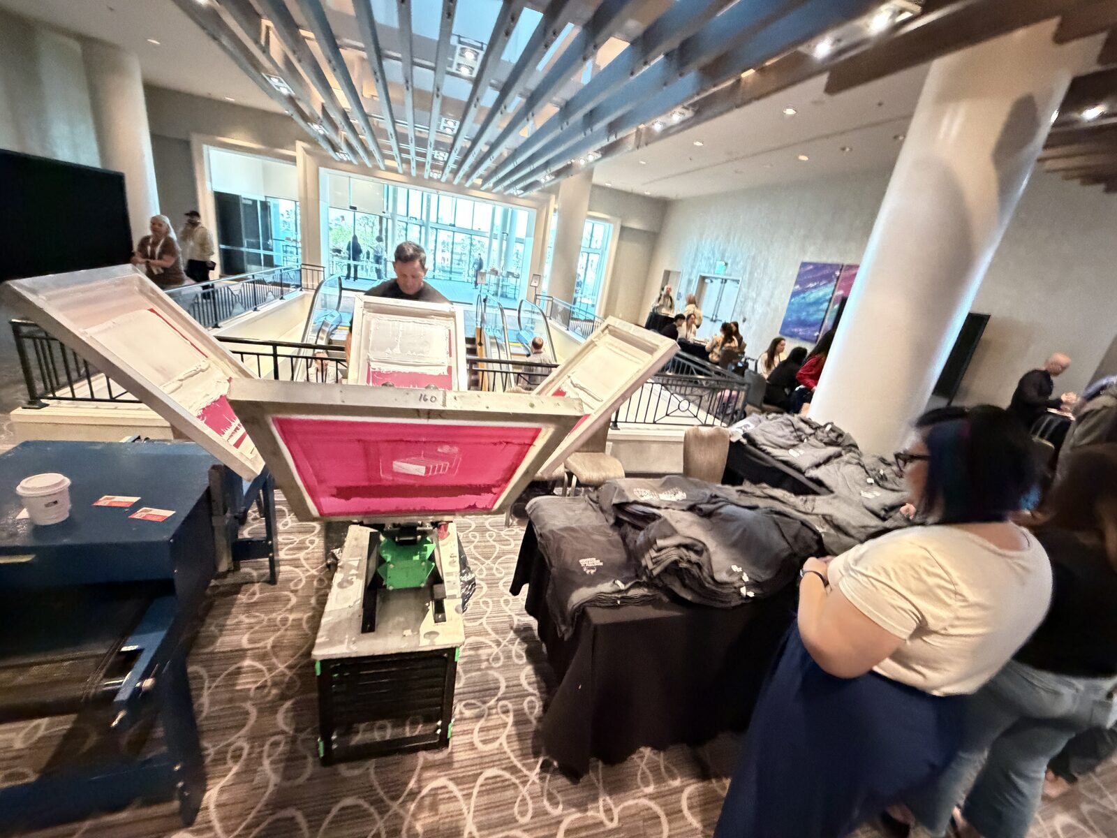 Merch Troop live printing — presses rolling at the event